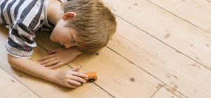 111108082205-boy-child-playing-car-floor-autism-horizontal-large-gallery